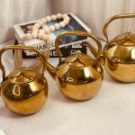 ابريق شاي ذهبي يد معدن (احجام مختلفة في الوصف)