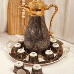 طقم تيرمس دلة بورسلان مكفول + 12 فنجان بورسلان + صينية بورسلان